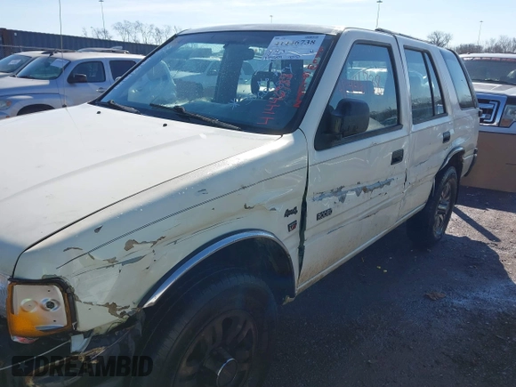 1997 Isuzu Rodeo z VIN 4S2CK58V2V4300048, wystawiony jako IAAI lot #41446738 z przebiegiem 195 609 mil mil oraz . Historia ofert i sprzedaży dostępna na DreamBid. Obrazek 6.