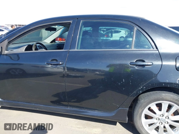 2010 Toyota Corolla with VIN 1NXBU4EE2AZ299148, listed as a IAAI auction lot 41884899 with 303,174 mi miles. Bid and sale history available at carsss.com. Image 14.