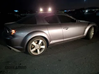 2005 Mazda RX-8 with VIN JM1FE17N950157715, listed as a Copart auction lot 76077944 with 102,174 mi miles and Salvage Title. Bid and sale history available at carsss.com. Image 3.