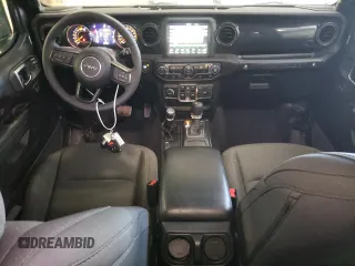 2023 Jeep Wrangler Sport Altitude with VIN 1C4HJXDG0PW679789, listed as a Copart auction lot 65991094 with 13,503 mi miles and Salvage Title. Bid and sale history available at DreamBid. Image 8.