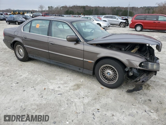 1997 BMW 7 Series 740il with VIN WBAGJ8325VDM01757, listed as a Copart auction lot 85734614 with 190,453 mi miles and Non Repairable. Bid and sale history available at carsss.com. Image 4.