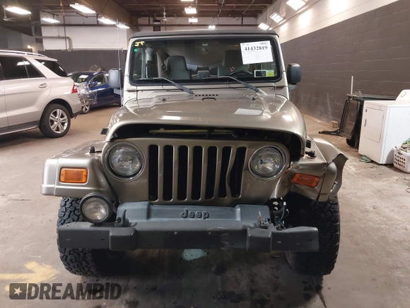2004 Jeep Wrangler Sahara with VIN 1J4FA59S64P736389, listed as a IAAI auction lot 41432819 with 102,830 mi miles and . Bid and sale history available at DreamBid. Image 12.