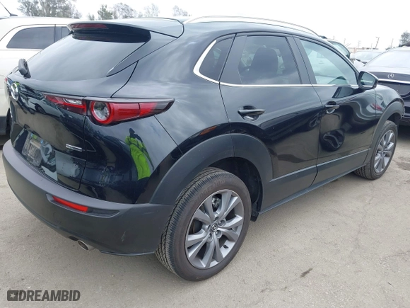 2024 Mazda CX-30 2.5 S Preferred Package with VIN 3MVDMBCMXRM669336, listed as a IAAI auction lot 41895722 with 23,554 mi miles. Bid and sale history available at carsss.com. Image 4.