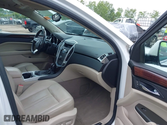 2012 Cadillac SRX Performance Collection with VIN 3GYFNEE32CS658275, listed as a IAAI auction lot 42514540 with 131,588 mi miles and . Bid and sale history available at DreamBid. Image 5.
