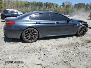 2016 BMW M6 with VIN WBS6E9C5XGG437084, listed as a Copart auction lot 53632315 with 108,151 mi miles and Salvage title. Bid and sale history available at DreamBid. Image 3.
