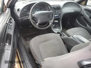 2000 Ford Mustang z VIN 1FAFP404XYF179209, wystawiony jako Copart lot #56727285 z przebiegiem 268 415 mil mil oraz Szkoda całkowita • Salvage title. Historia ofert i sprzedaży dostępna na DreamBid. Obrazek 8.