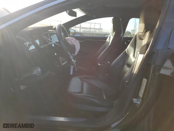 2014 Tesla Model S P85D with VIN 5YJSA1H21EFP62750, listed as a Copart auction lot 87676375 with 67,514 mi miles and Salvage Title. Bid and sale history available at carsss.com. Image 7.