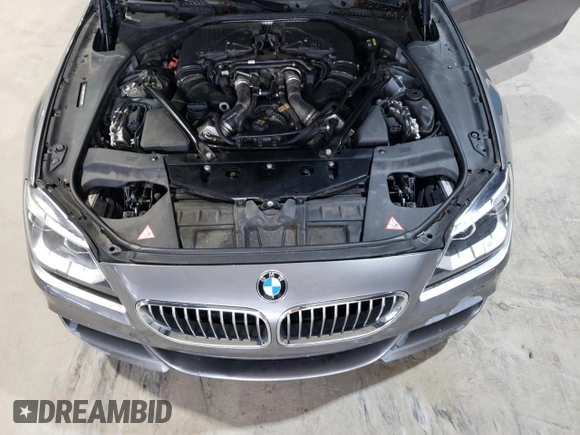 2015 BMW 6 Series 650i xDrive z VIN WBAYM1C53FD325311, wystawiony jako Copart lot #59563355 z przebiegiem 157 675 mil mil oraz Czysty tytuł • Clean title. Historia ofert i sprzedaży dostępna na DreamBid. Obrazek 11.