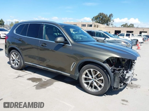 2021 BMW X5 xDrive45e with VIN 5UXTA6C02M9F01452, listed as a IAAI auction lot 41946575 with 37,868 mi miles. Bid and sale history available at carsss.com. Image 1.