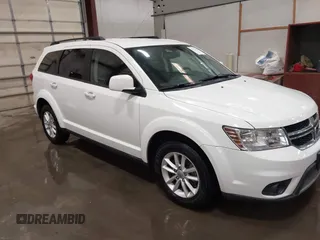 2015 Dodge Journey SXT z VIN 3C4PDCBG6FT709042, wystawiony jako IAAI lot #41979307 z przebiegiem 116 713 mil mil oraz . Historia ofert i sprzedaży dostępna na DreamBid. Obrazek 1.