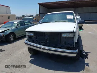 1996 Chevrolet Tahoe z VIN 1GNEK13R9TJ357134, wystawiony jako IAAI lot #42218520 z przebiegiem 213 135 mil mil oraz . Historia ofert i sprzedaży dostępna na DreamBid. Obrazek 13.