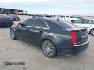 2013 Cadillac CTS Performance with VIN 1G6DJ5E37D0156897, listed as a IAAI auction lot 41359292 with 152,051 mi miles and . Bid and sale history available at DreamBid. Image 3.