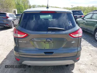 2016 Ford Escape SE z VIN 1FMCU9GX2GUA47702, wystawiony jako IAAI lot #42160145 z przebiegiem 90 765 mil mil oraz . Historia ofert i sprzedaży dostępna na DreamBid. Obrazek 17.