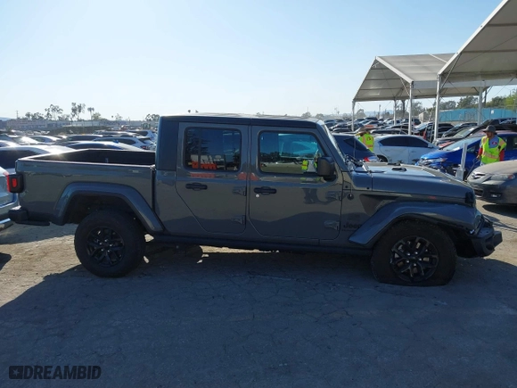 2023 Jeep Gladiator Freedom with VIN 1C6HJTAG9PL517097, listed as a IAAI auction lot 41860666 with 24,478 mi miles. Bid and sale history available at carsss.com. Image 13.