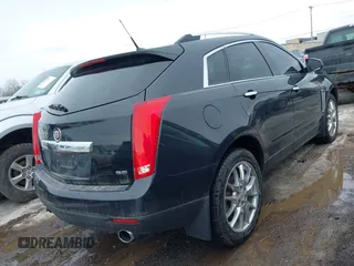 2013 Cadillac SRX Performance Collection with VIN 3GYFNHE33DS527519, listed as a IAAI auction lot 41652822 with 201,580 mi miles. Bid and sale history available at carsss.com. Image 4.