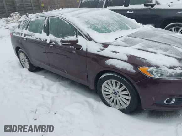 2013 Ford Fusion SE Hybrid with VIN 3FA6P0LU1DR316619, listed as a IAAI auction lot 41515812 with 136,669 mi miles and . Bid and sale history available at carsss.com. Image 13.