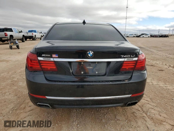 2015 BMW 7 Series 740Li xDrive with VIN WBAYF4C50FGS99289, listed as a Copart auction lot 79809474 with 128,993 mi miles and Salvage Title. Bid and sale history available at carsss.com. Image 6.