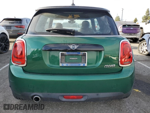 2020 MINI Hardtop Cooper with VIN WMWXR3C00L2M30375, listed as a Copart auction lot 51016485 with 105,486 mi miles and Salvage title. Bid and sale history available at DreamBid. Image 6.