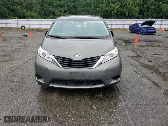 2011 Toyota Sienna LE AAS with VIN 5TDKK3DCXBS126391, listed as a Copart auction lot 62604005 with 252,346 mi miles and Salvage title. Bid and sale history available at DreamBid. Image 14.