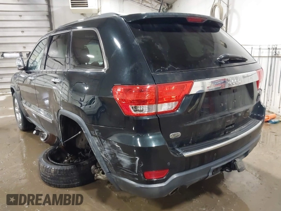 2013 Jeep Grand Cherokee Overland with VIN 1C4RJECT4DC526465, listed as a IAAI auction lot 41570663 with 116,948 mi miles. Bid and sale history available at carsss.com. Image 3.