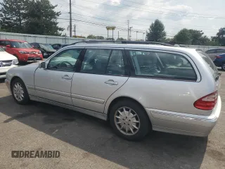 2001 Mercedes-Benz E-Class with VIN WDBJH65J41B201471, listed as a Copart auction lot 68863194 with 106,893 mi miles and Salvage Title. Bid and sale history available at carsss.com. Image 2.