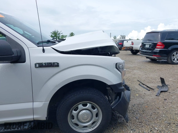 2018 Ford F-150 XL z VIN 1FTFX1E59JKE52129, wystawiony jako IAAI lot #42233231 z przebiegiem 97 262 mil mil oraz . Historia ofert i sprzedaży dostępna na DreamBid. Obrazek 21.