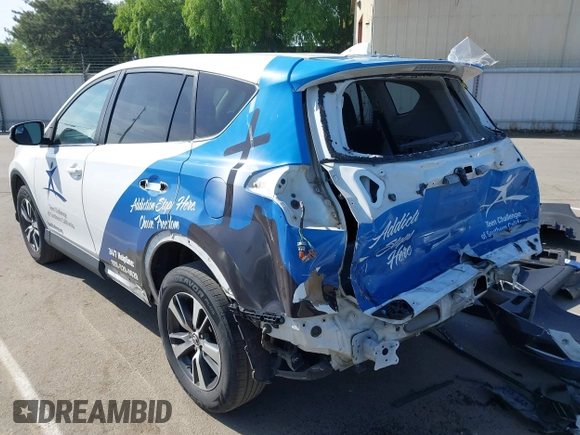 2018 Toyota RAV4 XLE with VIN 2T3WFREV7JW480326, listed as a IAAI auction lot 42021965 with 174,347 mi miles. Bid and sale history available at carsss.com. Image 6.