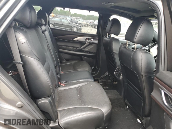 2018 Mazda CX-9 Grand Touring z VIN JM3TCBDY9J0208533, wystawiony jako Copart lot #59854635 z przebiegiem 90 263 mil mil oraz Szkoda całkowita • Salvage title. Historia ofert i sprzedaży dostępna na DreamBid. Obrazek 11.