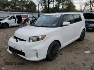 2014 Scion xB with VIN JTLZE4FE3EJ050898, listed as a Copart auction lot 52227715 with 69,629 mi miles and Salvage Title. Bid and sale history available at carsss.com. Image 1.