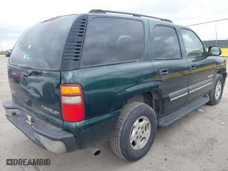 2003 Chevrolet Tahoe LS with VIN 1GNEC13V13J250718, listed as a IAAI auction lot 41981819 with 303,969 mi miles. Bid and sale history available at carsss.com. Image 4.