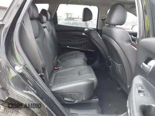 2019 Hyundai Santa Fe Ultimate with VIN 5NMS5CAA8KH019109, listed as a IAAI auction lot 41120391 with 101,829 mi miles and . Bid and sale history available at DreamBid. Image 8.