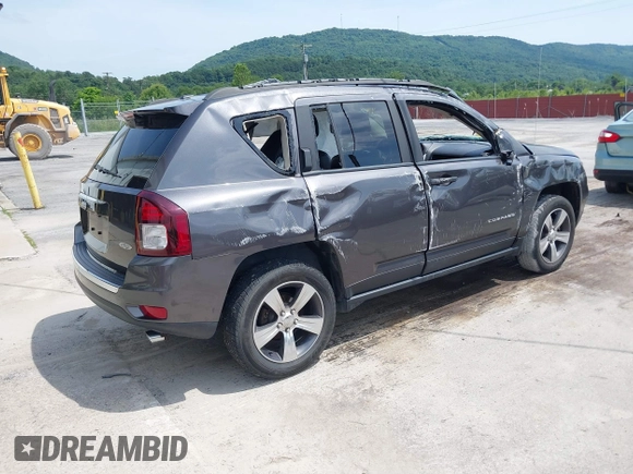 2016 Jeep Compass High Altitude Edition with VIN 1C4NJDEB0GD558230, listed as a IAAI auction lot 39799941 with 57,002 mi miles. Bid and sale history available at carsss.com. Image 4.