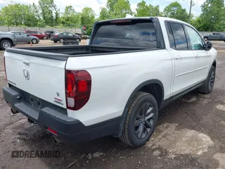 2021 Honda Ridgeline Sport with VIN 5FPYK3F14MB005117, listed as a IAAI auction lot 42343059 with 58,862 mi miles and . Bid and sale history available at DreamBid. Image 4.