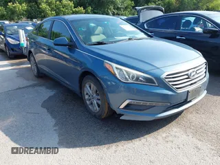 2015 Hyundai Sonata SE z VIN 5NPE24AF7FH218135, wystawiony jako IAAI lot #42410851 z przebiegiem 79 263 mil mil oraz . Historia ofert i sprzedaży dostępna na DreamBid. Obrazek 1.