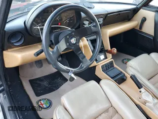 1991 Alfa Romeo Spider z VIN ZARBB32G1M6007546, wystawiony jako Copart lot #79666614 z przebiegiem 72 567 mil mil oraz Czysty tytuł • Clean title. Historia ofert i sprzedaży dostępna na DreamBid. Obrazek 8.