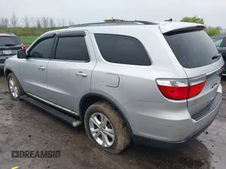 2012 Dodge Durango Crew with VIN 1C4RDJDG0CC322388, listed as a IAAI auction lot 42179814 with 124,009 mi miles and . Bid and sale history available at carsss.com. Image 3.