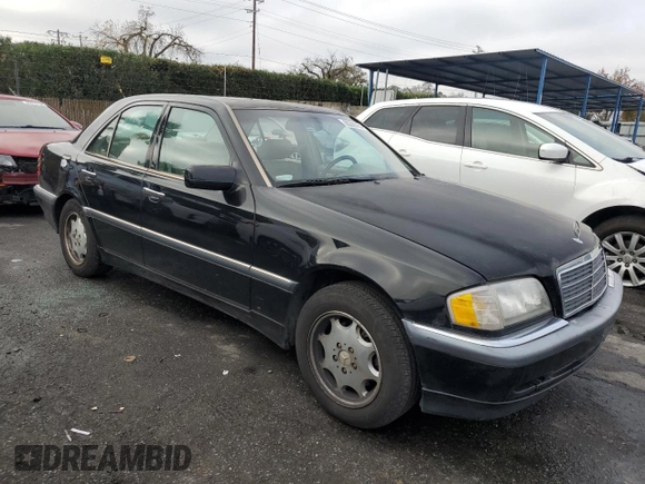 2000 Mercedes-Benz C 230 Kompressor with VIN WDBHA24G6YA833700, listed as a Copart auction lot 85366954 with 344,518 mi miles and Clean Title. Bid and sale history available at carsss.com. Image 4.
