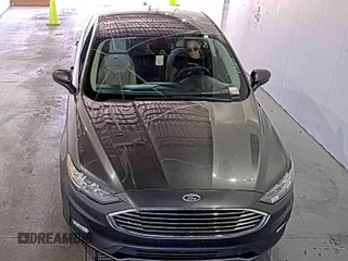 2020 Ford Fusion SE z VIN 3FA6P0HD6LR189762, wystawiony jako IAAI lot #42780149 z przebiegiem 51 099 mil mil oraz . Historia ofert i sprzedaży dostępna na DreamBid. Obrazek 19.