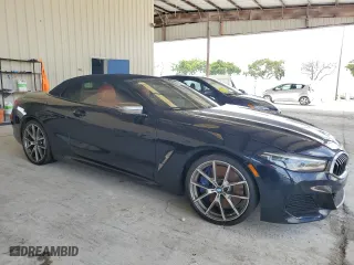 2019 BMW 8 Series M850i xDrive with VIN WBAFY4C59KBX38790, listed as a Copart auction lot 69656654 with 30,863 mi miles and Salvage Title. Bid and sale history available at carsss.com. Image 4.