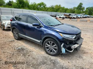 2020 Honda CR-V Touring с VIN 2HKRW2H9XLH631074, выставлен на аукционе Copart как лот 62957255 с пробегом 21 460 миль миль и Списание • Salvage title. История ставок и продаж доступна на DreamBid. Изображение 4.