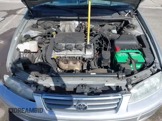 2001 Toyota Camry LE z VIN JT2BF22KX10342454, wystawiony jako IAAI lot #41939743 z przebiegiem 124 045 mil mil oraz . Historia ofert i sprzedaży dostępna na DreamBid. Obrazek 10.
