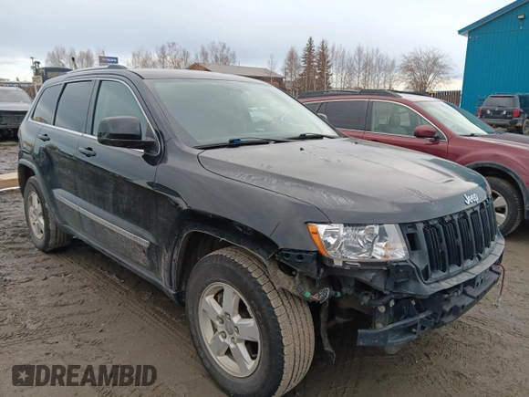 2011 Jeep Grand Cherokee Laredo z VIN 1J4RR4GG5BC508211, wystawiony jako Copart lot #53729935 z przebiegiem 124 408 mil mil oraz Szkoda całkowita • Salvage title. Historia ofert i sprzedaży dostępna na DreamBid. Obrazek 4.