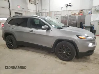 2015 Jeep Cherokee Latitude with VIN 1C4PJLCB7FW759695, listed as a Copart auction lot 50914555 with 225,179 mi miles and Clean Title. Bid and sale history available at DreamBid. Image 4.