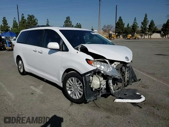 2013 Toyota Sienna XLE AAS with VIN 5TDYK3DC5DS322039, listed as a Copart auction lot 61657715 with 185,269 mi miles and Salvage title. Bid and sale history available at DreamBid. Image 15.