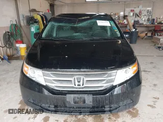 2012 Honda Odyssey EX z VIN 5FNRL5H4XCB017557, wystawiony jako IAAI lot #42367322 z przebiegiem 209 630 mil mil oraz . Historia ofert i sprzedaży dostępna na DreamBid. Obrazek 12.