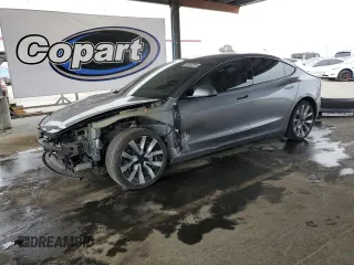 2024 Tesla Model 3 z VIN 5YJ3E1EA0RF859934, wystawiony jako Copart lot #52962285 z przebiegiem 32 329 mil mil oraz Szkoda całkowita • Salvage title. Historia ofert i sprzedaży dostępna na DreamBid. Obrazek 1.
