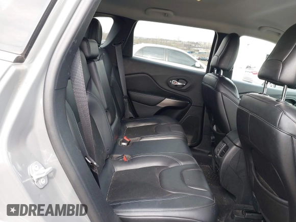 2019 Jeep Cherokee Latitude Plus with VIN 1C4PJMLX9KD445960, listed as a IAAI auction lot 41817194 with 99,194 mi miles and . Bid and sale history available at DreamBid. Image 8.