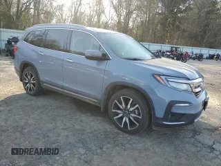 2022 Honda Pilot Touring 7-Passenger with VIN 5FNYF5H69NB031537, listed as a Copart auction lot 48986685 with 88,301 mi miles and Salvage title. Bid and sale history available at DreamBid. Image 4.