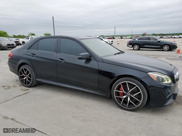2014 Mercedes-Benz E-Class E 63 AMG S-Model with VIN WDDHF7GB2EA957450, listed as a Copart auction lot 51844615 with 111,405 mi miles and Salvage Title. Bid and sale history available at carsss.com. Image 4.