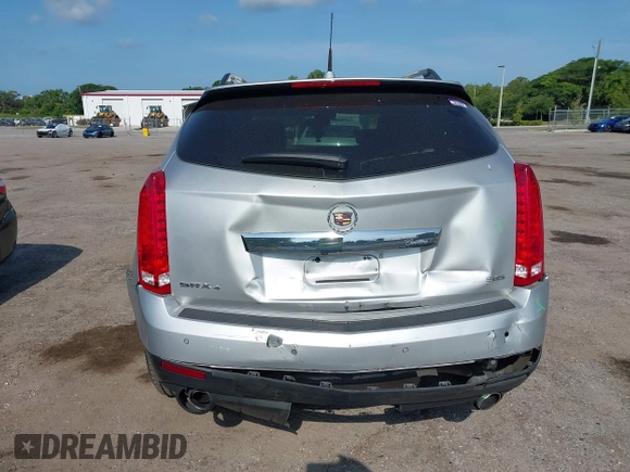 2014 Cadillac SRX Luxury Collection z VIN 3GYFNEE36ES652353, wystawiony jako IAAI lot #42233986 z przebiegiem 146 029 mil mil oraz . Historia ofert i sprzedaży dostępna na DreamBid. Obrazek 16.
